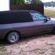 Illustration for article titled For $2,300, this custom Escort lowrider hearse lets you go in style